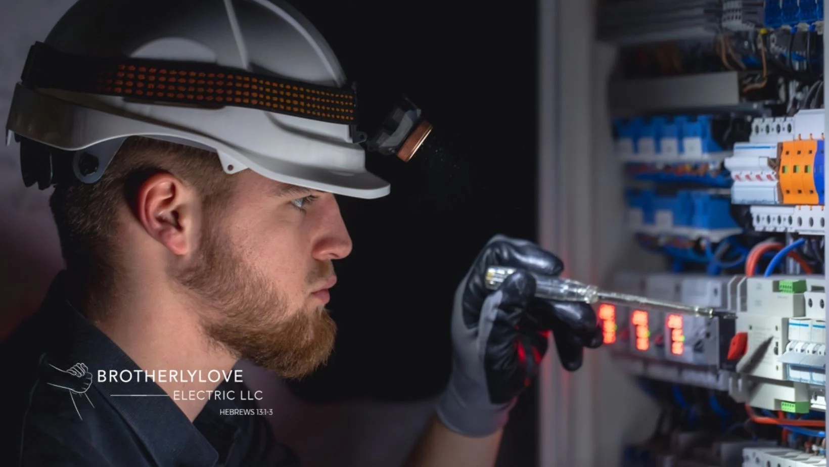 Electrician Resetting a Breaker Panel after an electrical emergency